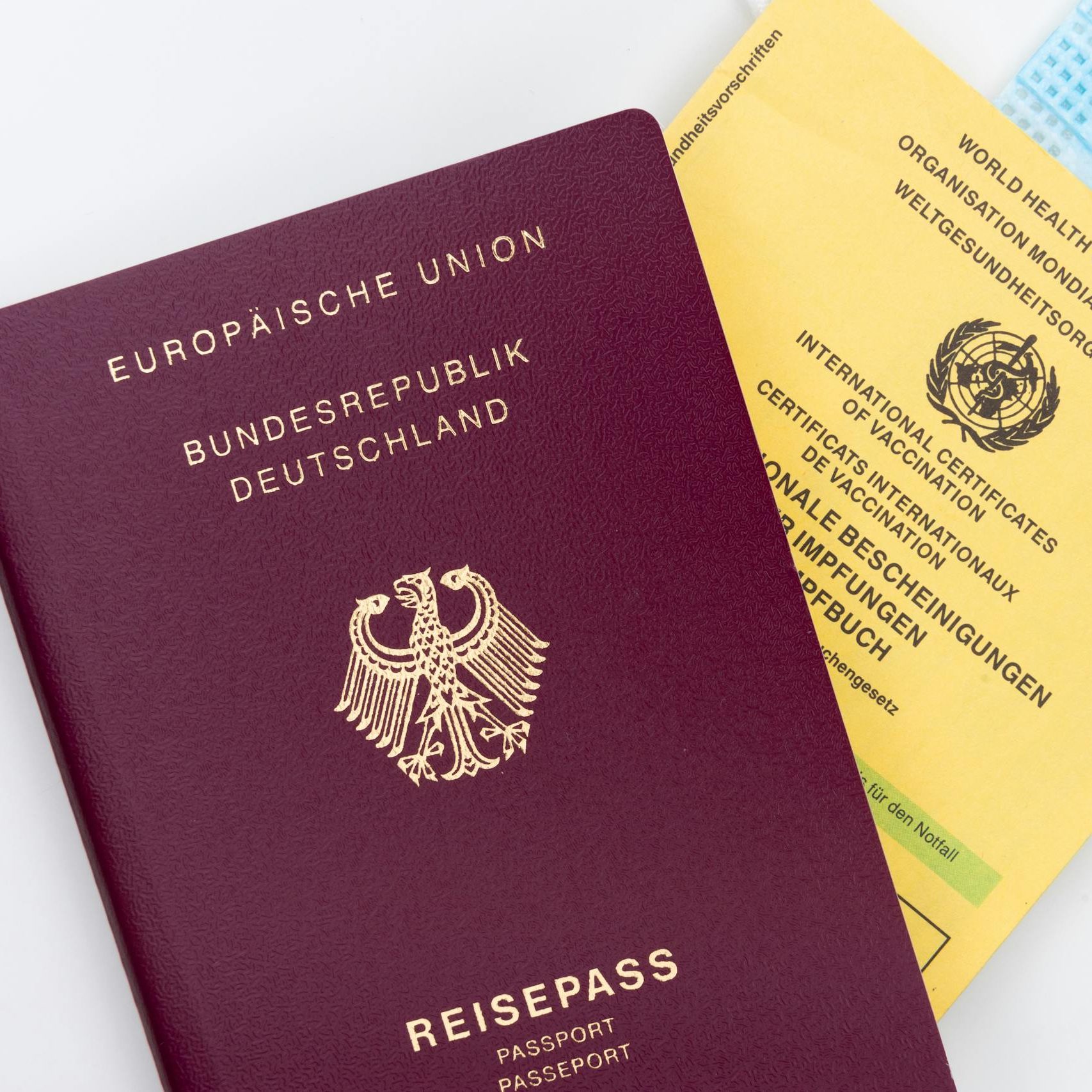 Close-up of a Passport and a Vaccination Card